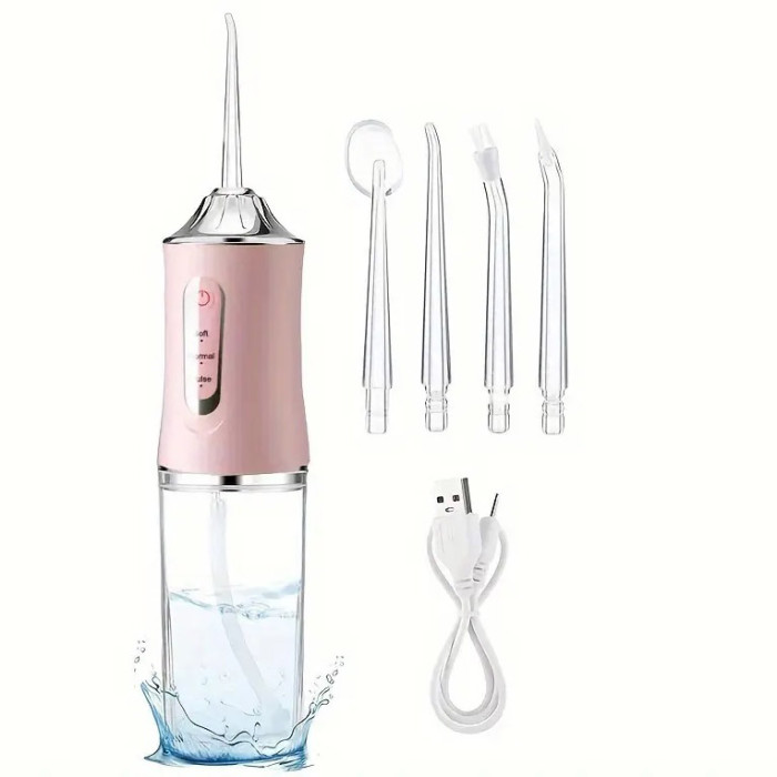 Іригатор для чищення зубів та порожнини рота Oral Irrigator з акумулятором та змінними насадками. Колір: рожевий