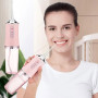 Іригатор для чищення зубів та порожнини рота Oral Irrigator з акумулятором та змінними насадками. Колір: рожевий
